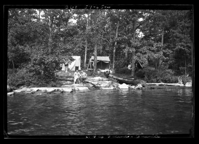 Camp on Juanita Island, Lake George Showing Tent Platforms and Campers