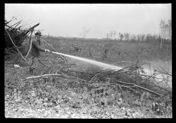 Com'r Osborne Putting Out a Fire Near Albany