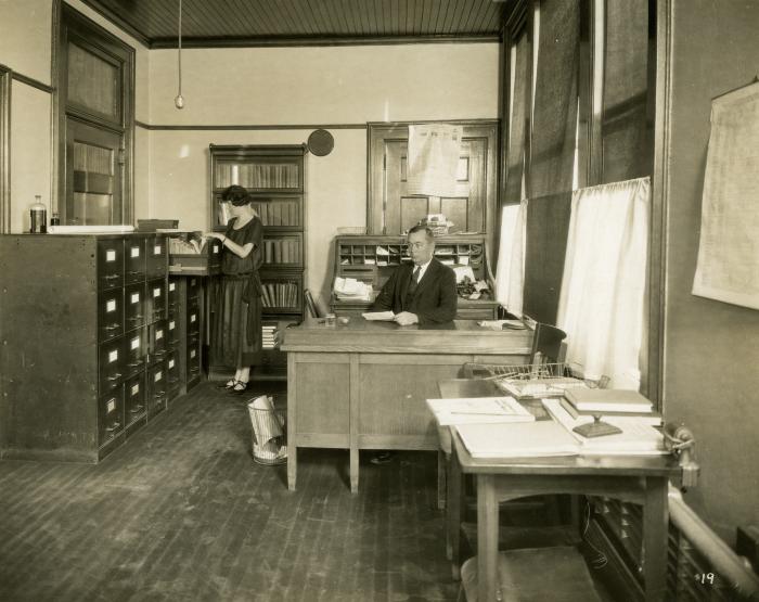 Official and assistant in an office, 1924