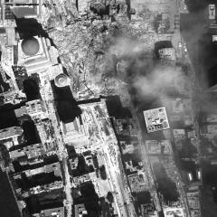 [Aerial photograph, flying northwest along west side of lower Manhattan, 09/15/2001]