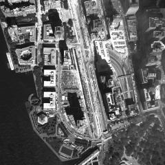 [Aerial photograph, flying northwest along west side of lower Manhattan, 09/15/2001]