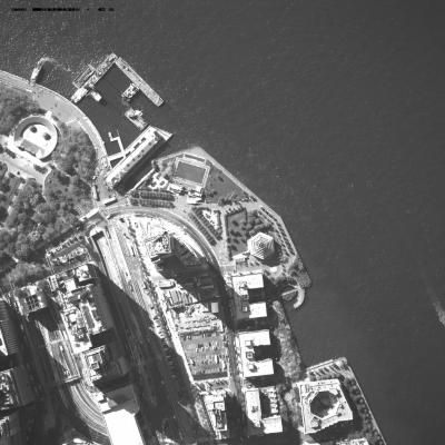 [Aerial photograph, flying southeast along west side of lower Manhattan, 10/21/2001]