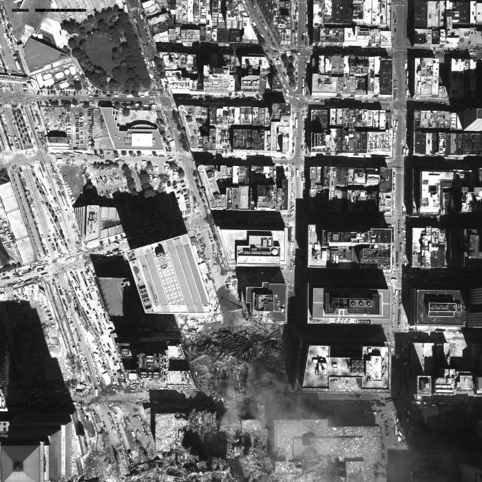 [Aerial photograph, flying northwest along west side of lower Manhattan, 09/15/2001]