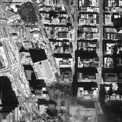 [Aerial photograph, flying northwest along west side of lower Manhattan, 09/15/2001]