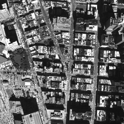 [Aerial photograph, flying northwest along west side of lower Manhattan, 09/15/2001]