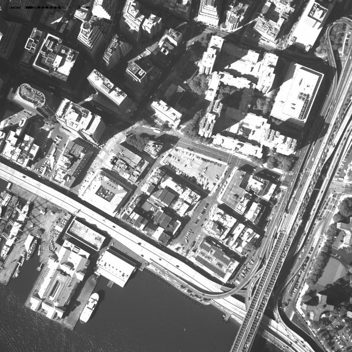 [Aerial photograph, flying northeast to southwest across lower Manhattan, 10/21/2001]