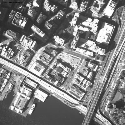 [Aerial photograph, flying northeast to southwest across lower Manhattan, 10/21/2001]