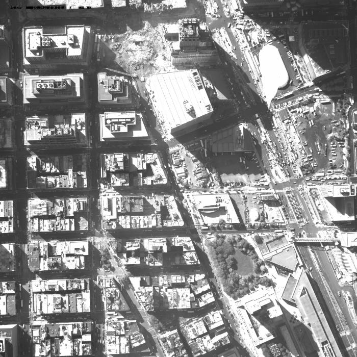 [Aerial photograph, flying southeast along west side of lower Manhattan, 10/21/2001]