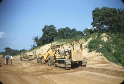Bulldozers and grading machine.