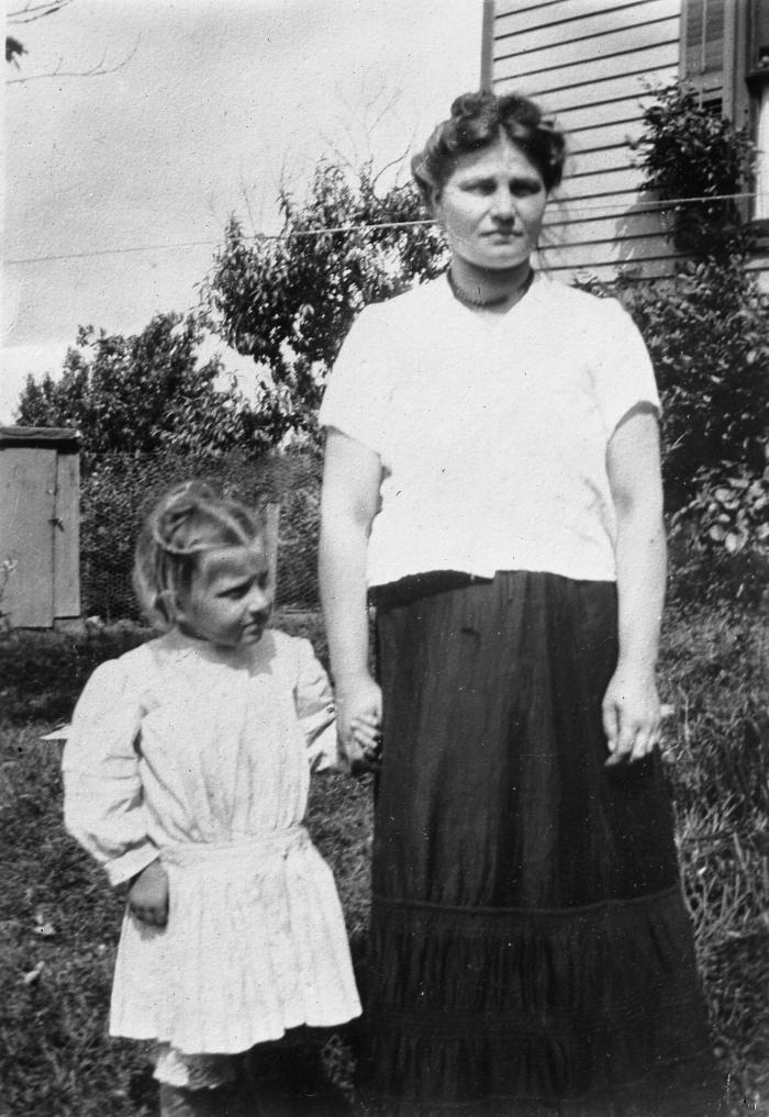 Night worker and her child outside home