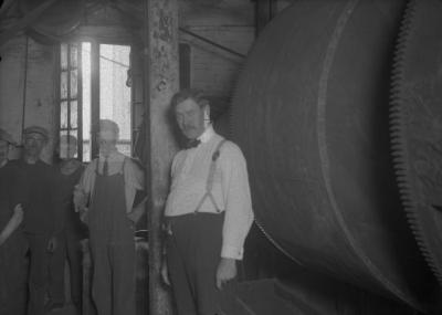 Group of men at factory