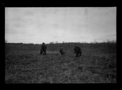 G. Hiedson Gould, Glen A. Seaby and George B. Wilder pointing to young trees Watson school guest's youngest plantation, planted 1928