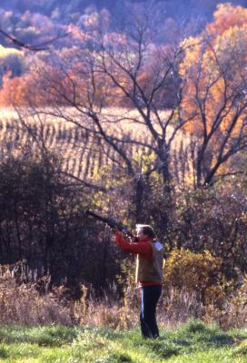 A hunter, with fall colors