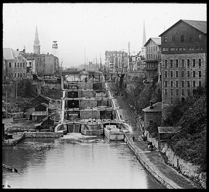 Two tiers of five locks, old Erie Canal; tow path on right. Lockport, N.Y.