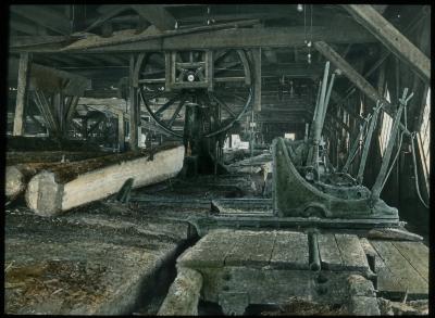 Large Sawmill: Band Saw, Carriage with Levers, Logs on Logway, Tupper Lake, N.Y.