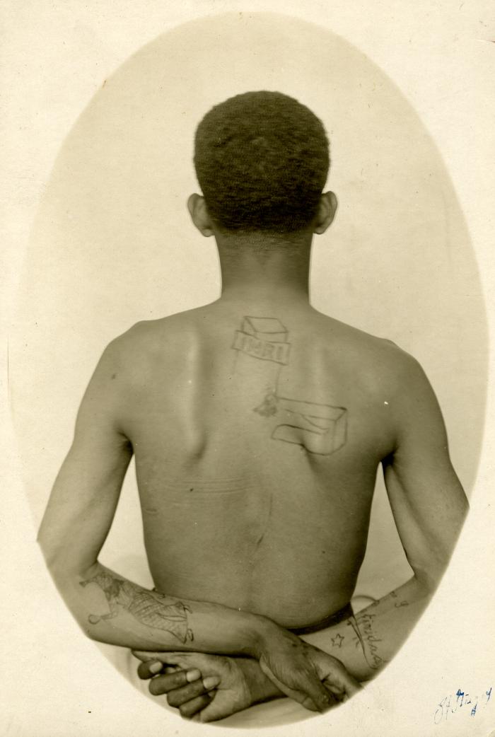 Inmate from Clinton Prison showing tattoos, No. 16