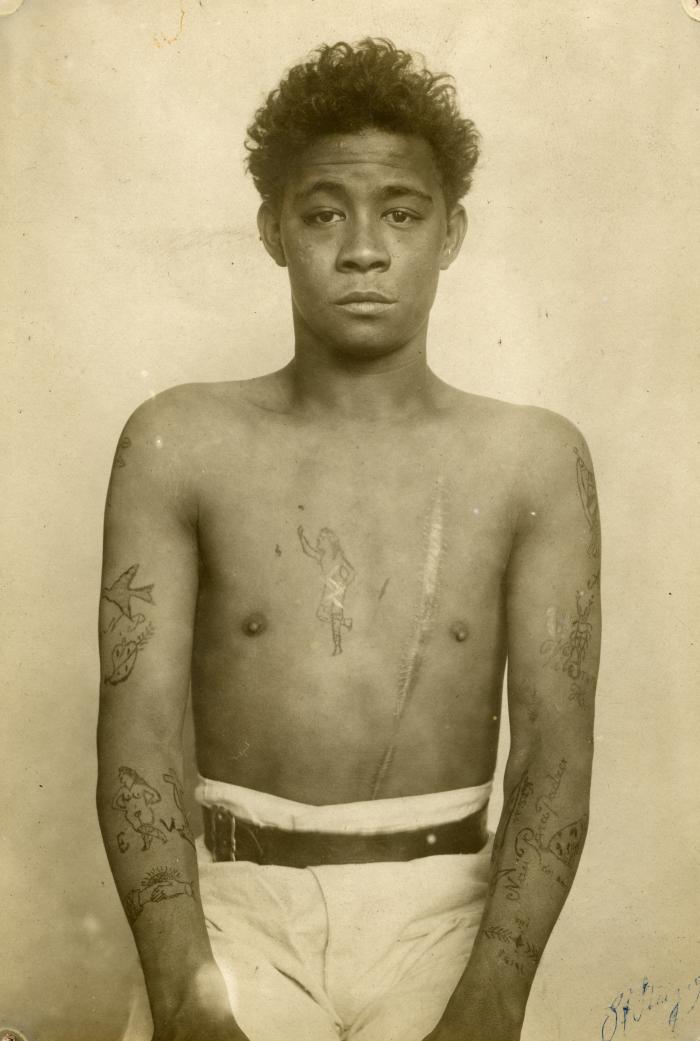 Inmate from Clinton Prison showing tattoos, No. 13