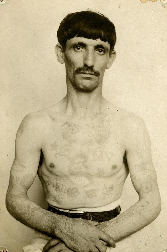 Inmate from Clinton Prison showing tattoos, No. 28