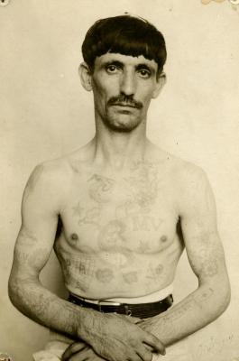 Inmate from Clinton Prison showing tattoos, No. 28