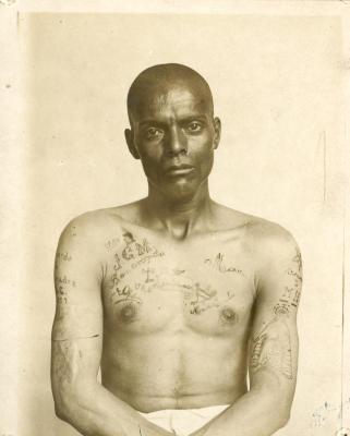 Inmate from Clinton Prison showing tattoos, No. 26