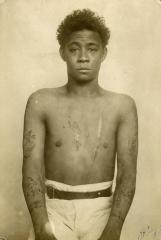 Inmate from Clinton Prison showing tattoos, No. 13