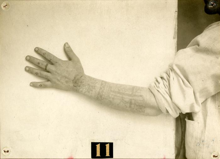 Inmate from Clinton Prison showing tattoos, No. 11