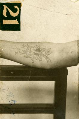 Inmate from Clinton Prison showing tattoos, No. 21