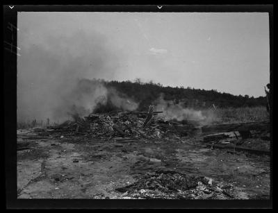 Fire set by CCC boys from crew in old barn foundation