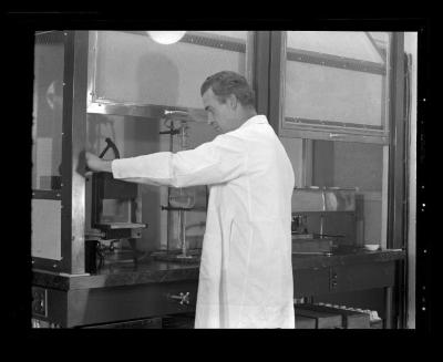 Scientist at a workstation at the Bayville Bridge experimental shellfish hatchery in Nassau County, N.Y.