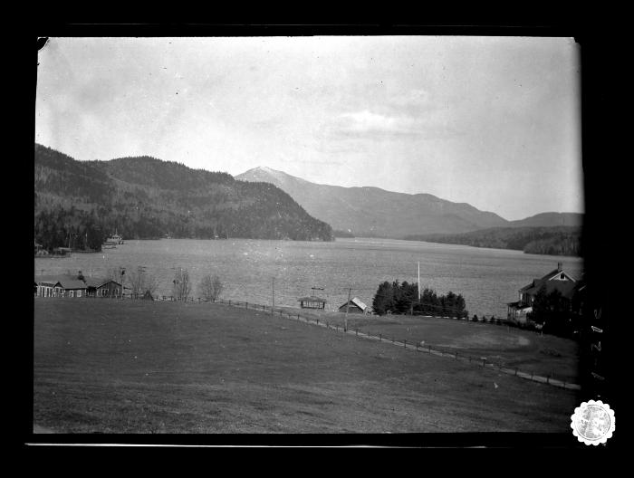 View of a country road alongside a lake