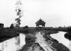 Irrigation canal and arch on a flagstone road, Szechuan, China