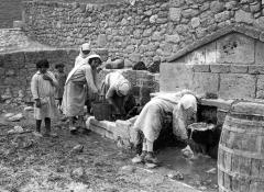 Girls Drawing Water at Public Fountain. Corinth, Greece