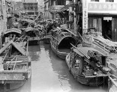 Sampans crowded in a small canal, Canton, China