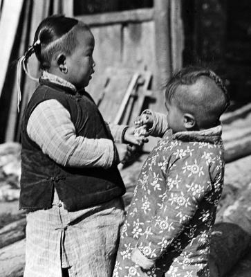 Two Chinese children in padded clothes, Nanchang, China