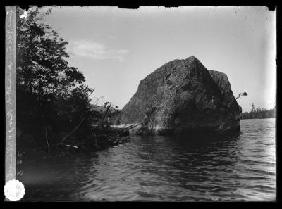 Large rock in Ampersand Pond