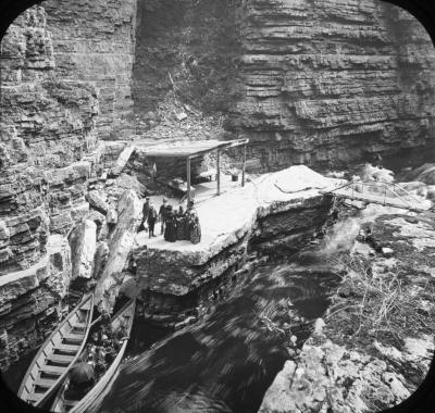 Starting a boat at Table Rock in Au Sable [sic] Chasm