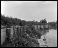 Wooden fence against land