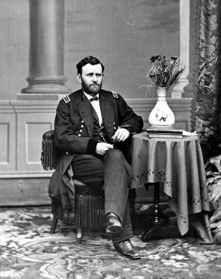 General Ulysses S. Grant seated at table