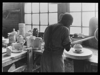 Expert Workman Making Models for Molds. Buffalo Pottery, Buffalo, N.Y.